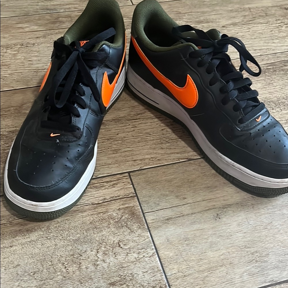 Nike Black and Orange Sneakers Classic Low-Top Design